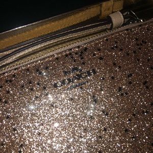 NWB Coach Star Glitter Wristlet rose gold